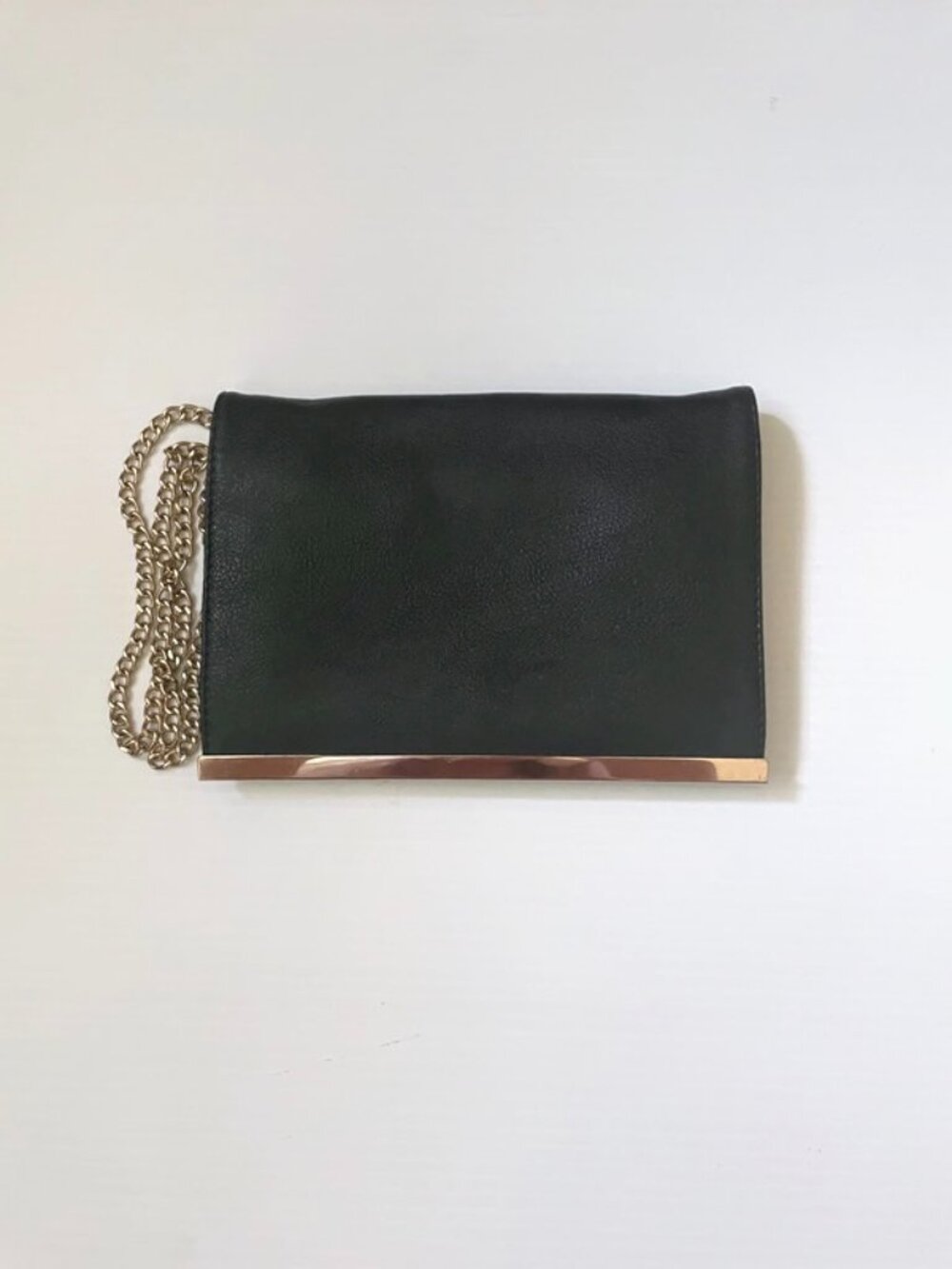 Okpta Small black crossbody with gold metal strap and gold piece design